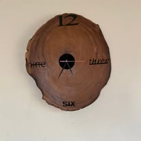 Horloge tronc — pièce signature